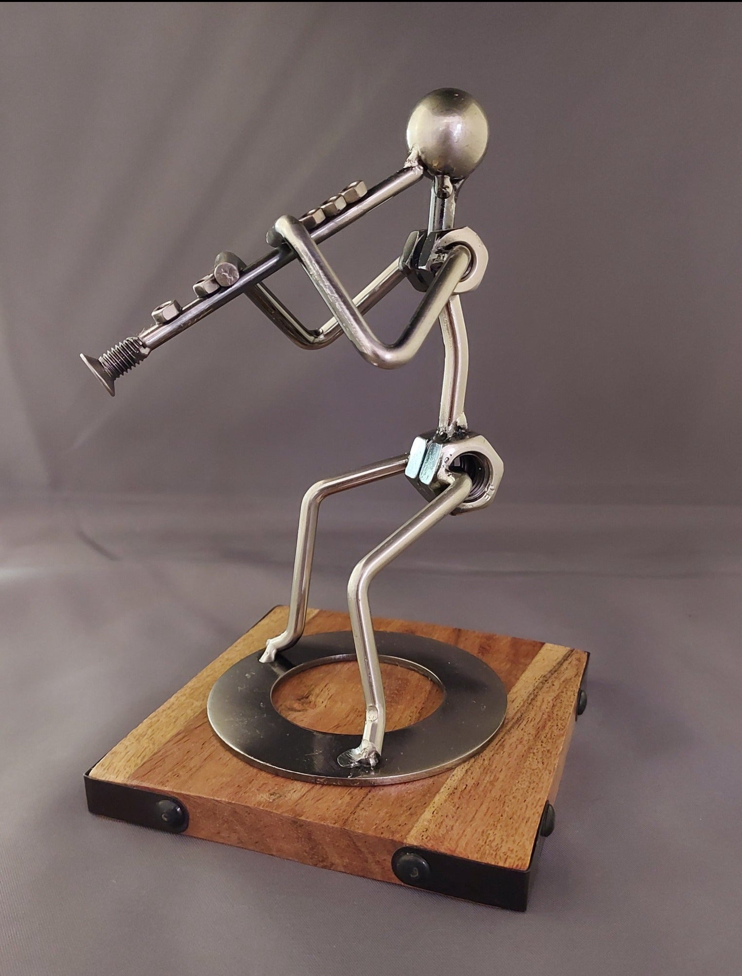 Silver Clarinet Player Figurine