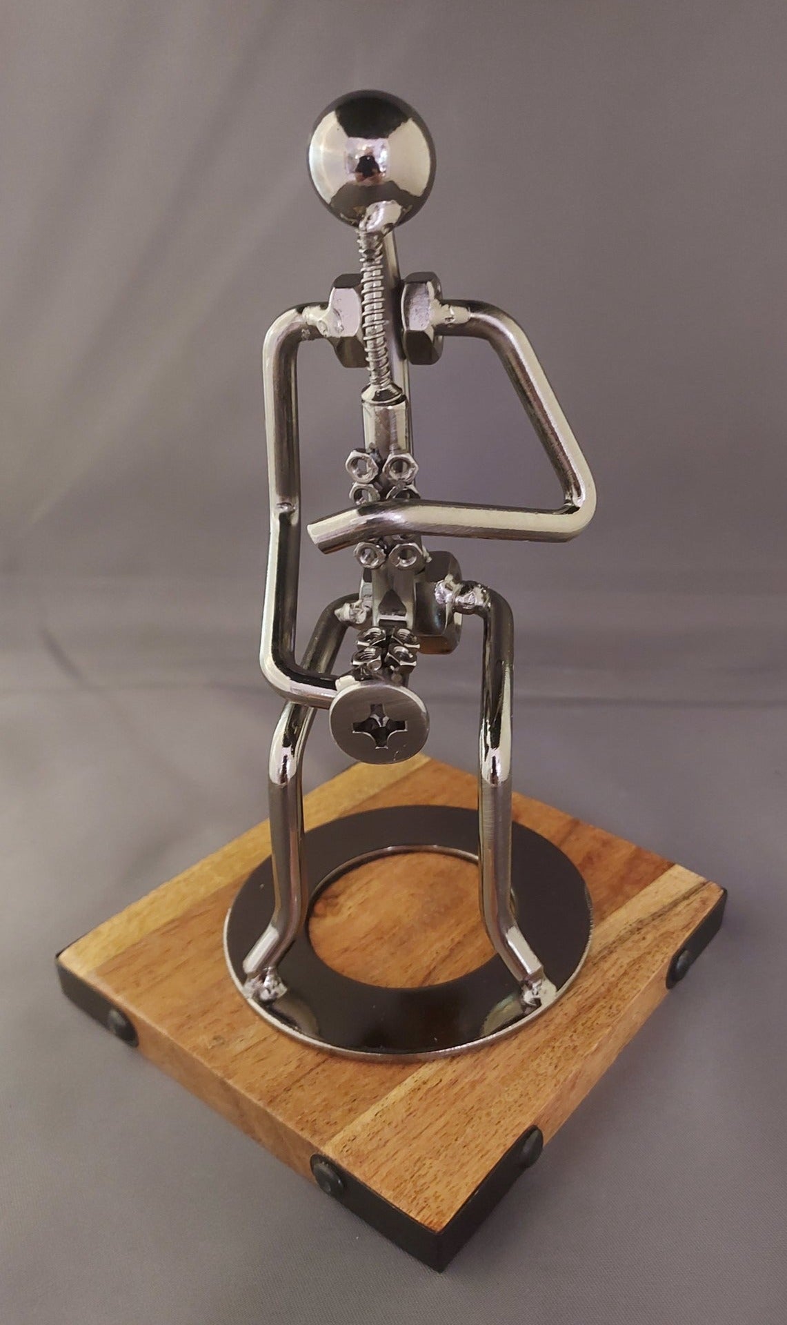 Silver Saxophone Player Figurine – Strum Hollow Music